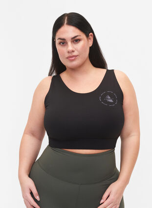 CORE, MID SUPPORT SPORTS BRA - Sports-BH med V-skjæring på ryggen, Black, Model image number 0