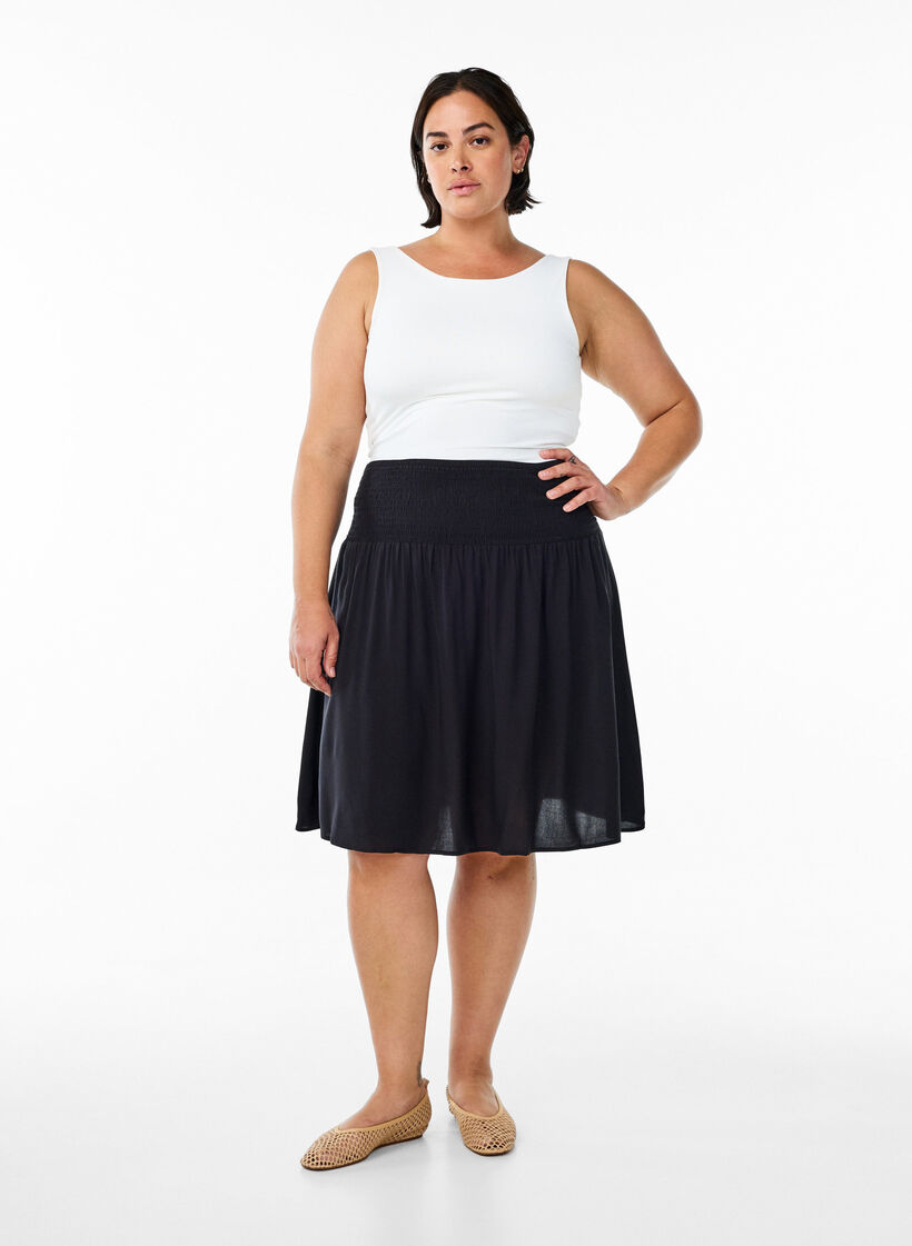 FLASH – kort skjørt med vaffelsydd midje, Svart, Model image number 1