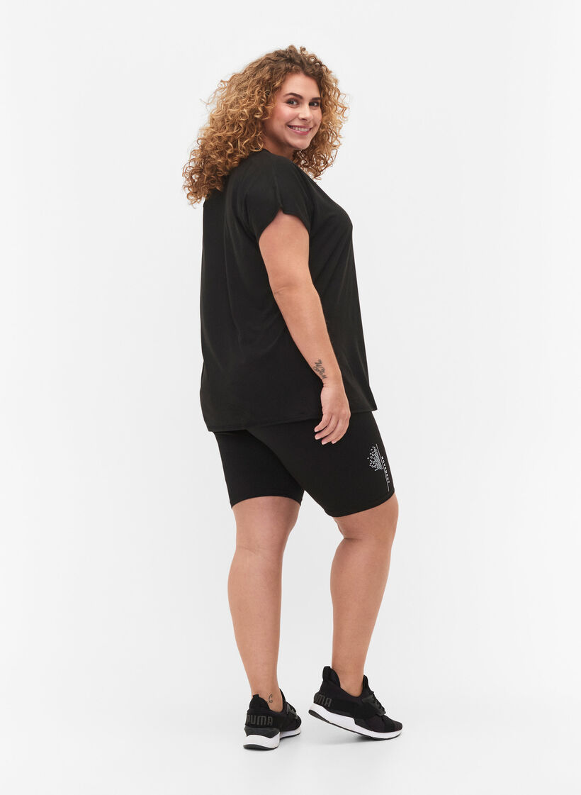 Tettsittende treningsshorts med logo, Black, Model image number 1