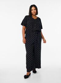 Prikket jumpsuit med korte ermer, Svart Prikket jumpsuit med korte ermer, Svart, Model