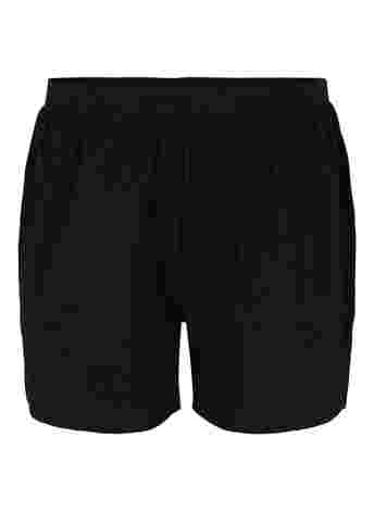 Løse shorts i en bomullsmiks
