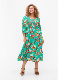 Kjole av viskose med mønster og smock øverst, Arcadia AOP, Model