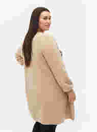 Lang strikket cardigan med ballongermer, Nomad Mel., Model