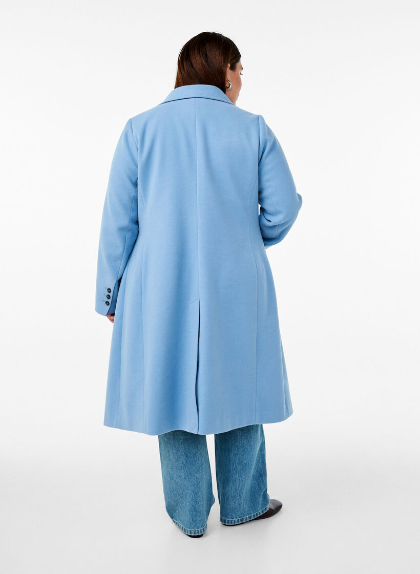 Lang kåpe med en splitt på ryggen, Della Robbia Blue, Model