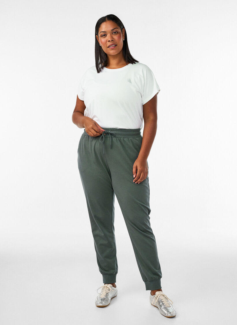 L&oslash;se joggebukser med lommer, Gr&oslash;nn, Model image number 0