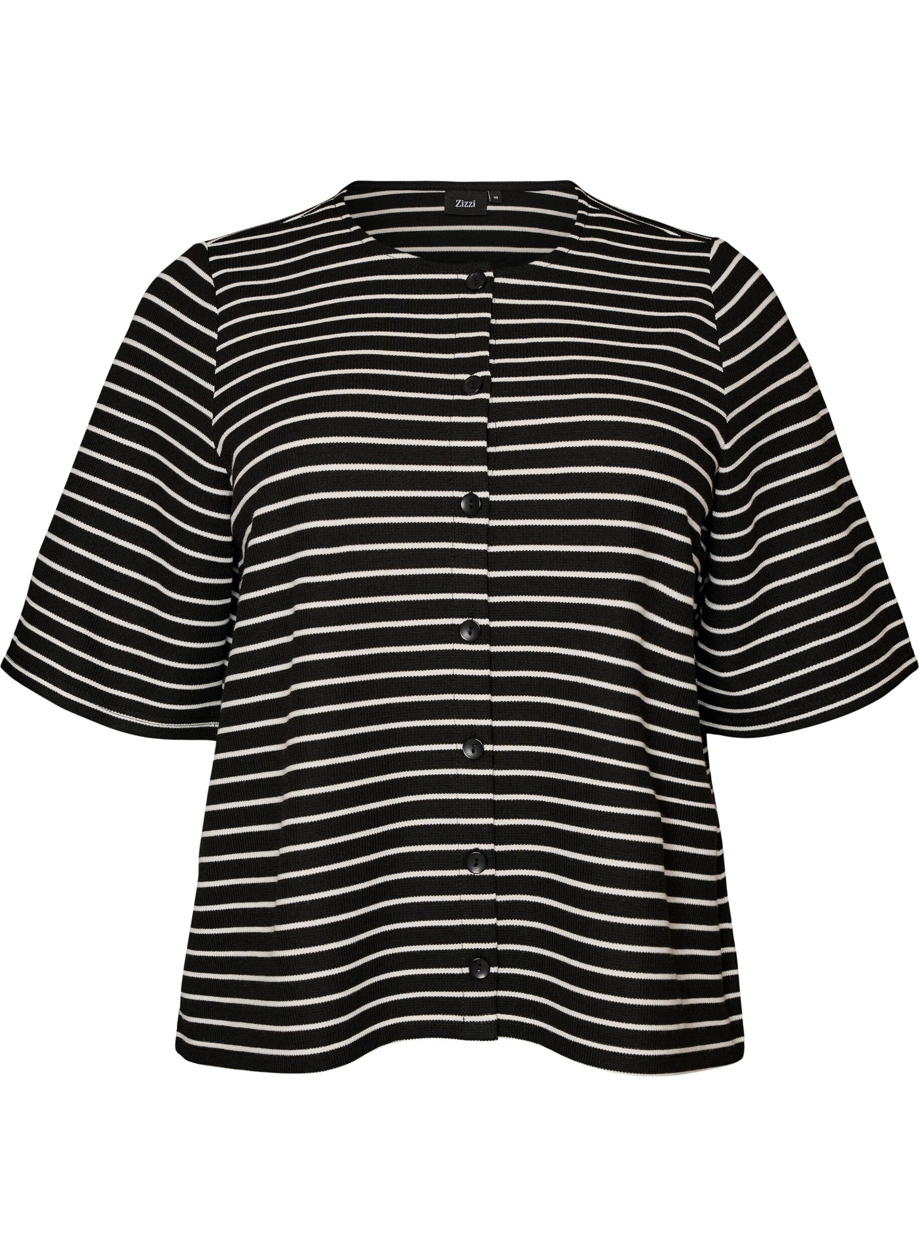 Bluse med ribbet tekstur og knappelukking