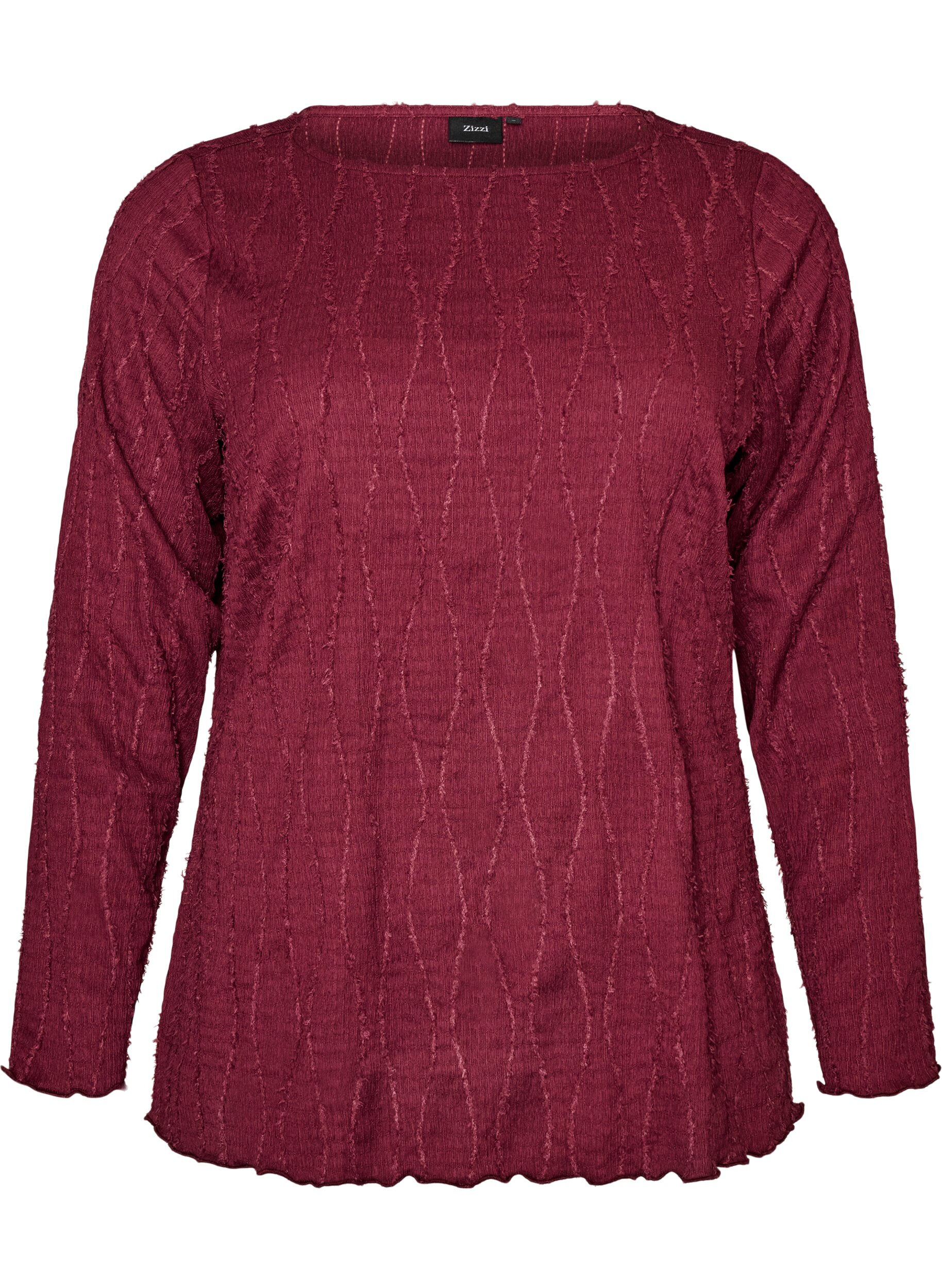 Jerseybluse med en b&oslash;lget tekstur