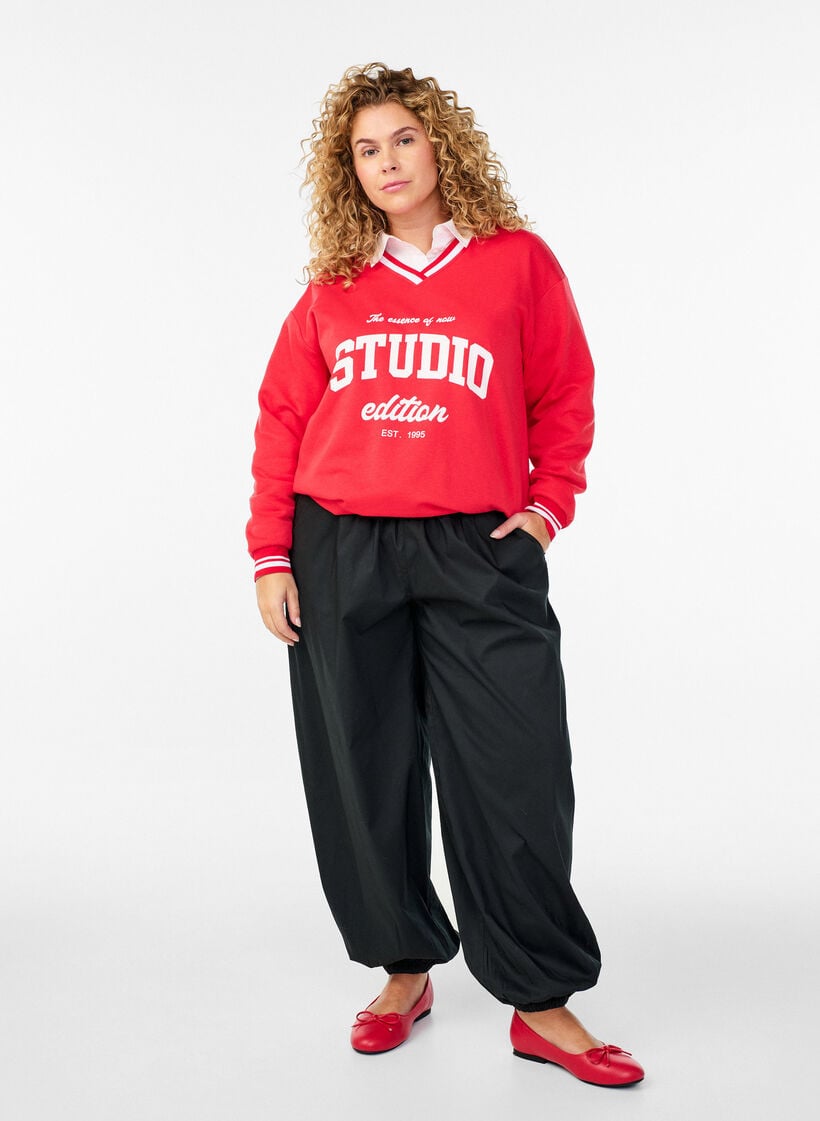 Ballongbukser med lommer og elastisk midje, Svart, Model image number 1