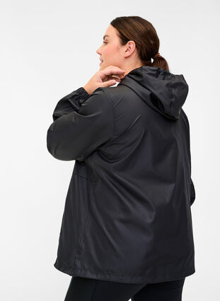 Treningsjakke med glidelås og hette, Black, Model image number 1