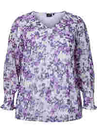 Blomstrete bluse med lange ermer og V-hals