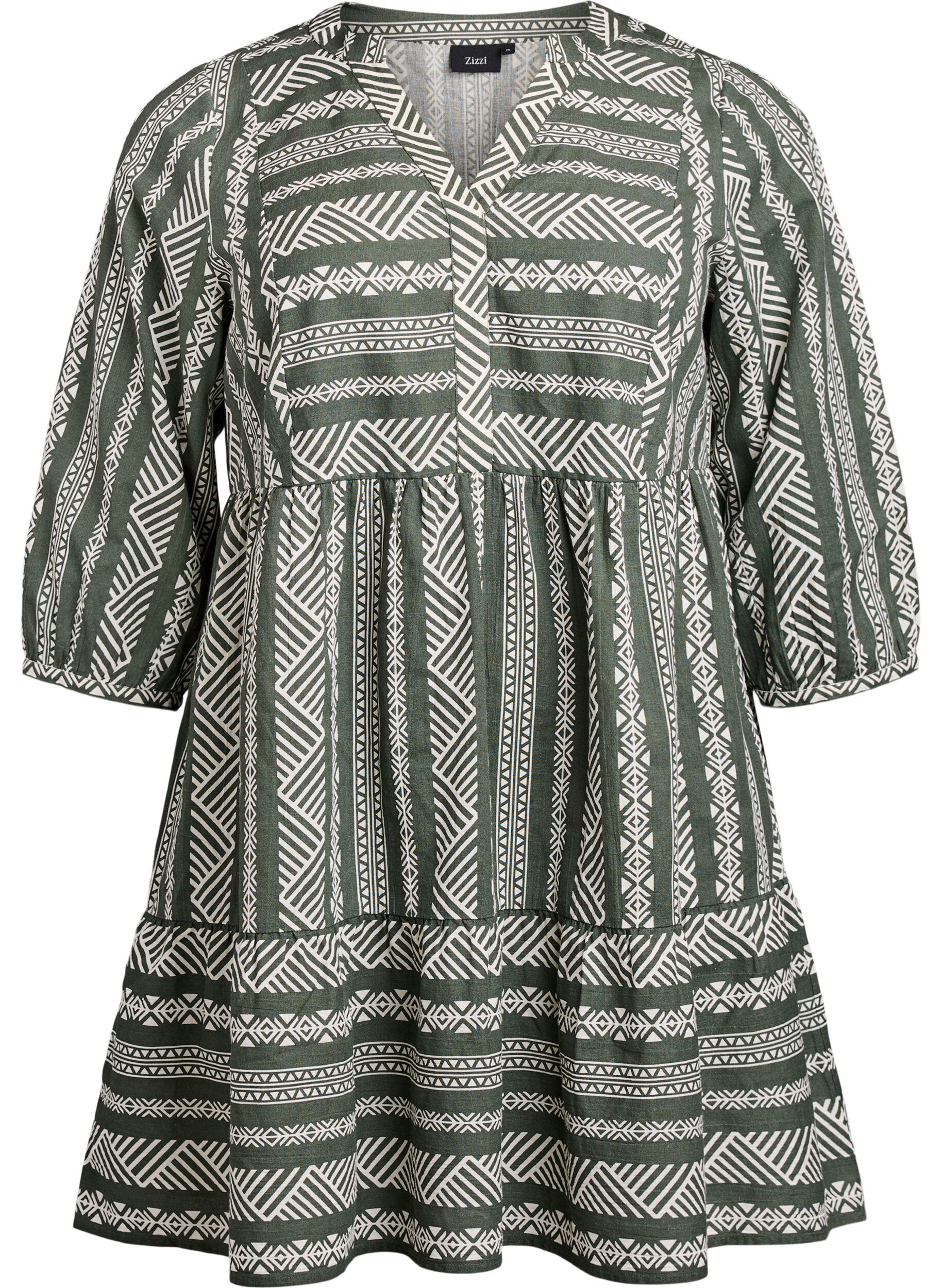 Kort kjole med grafisk trykk og 3/4-ermer