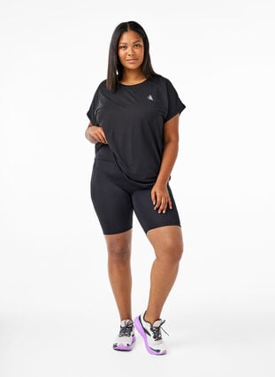 Ettersittende shorts med høy midje og lommer, Black, Model image number 3