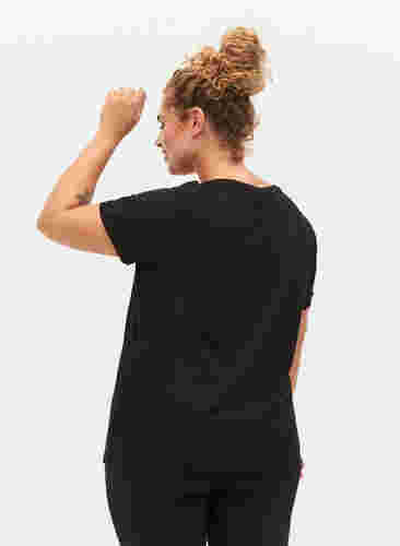 T-skjorte til trening med trykk, Black Don't Quit , Model image number 1