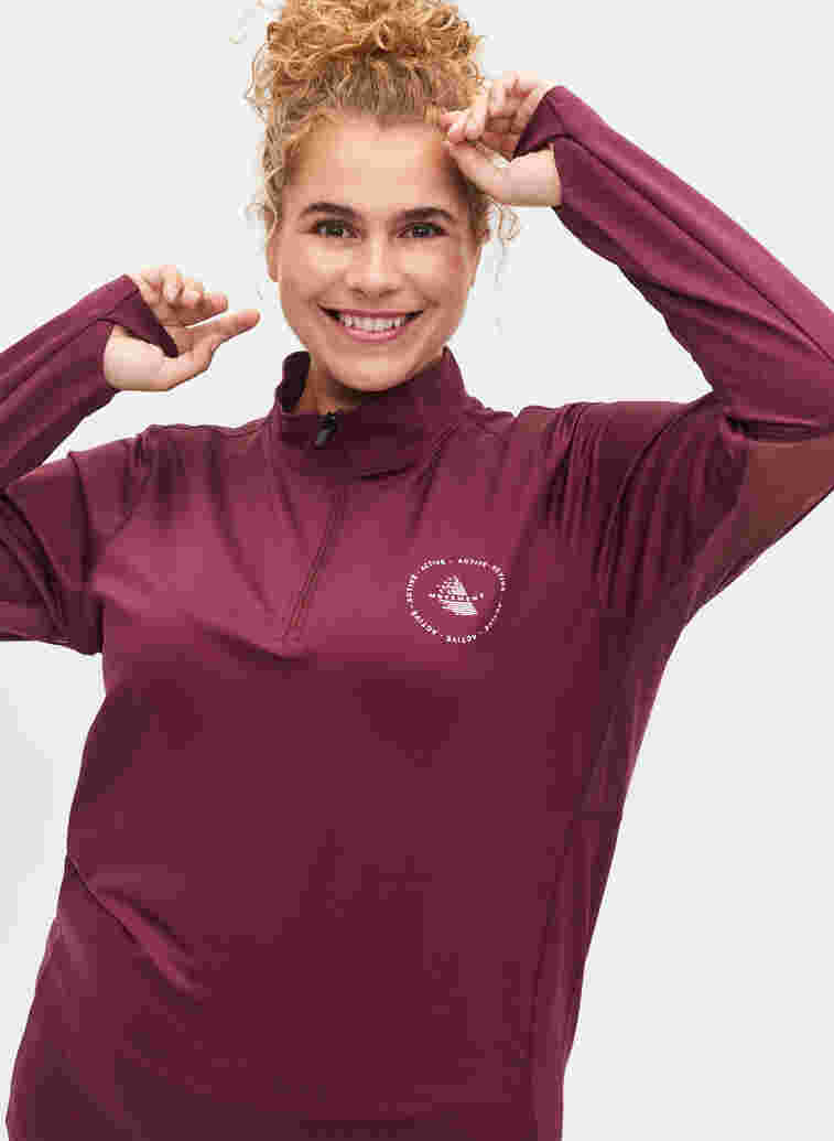 Høyhalset treningsgenser med glidelås, Fig, Model