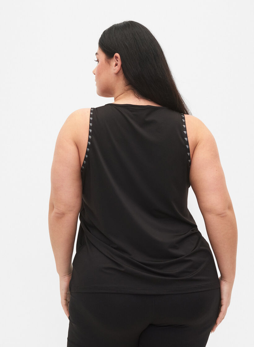 Ensfarget treningstopp, Black, Model image number 1