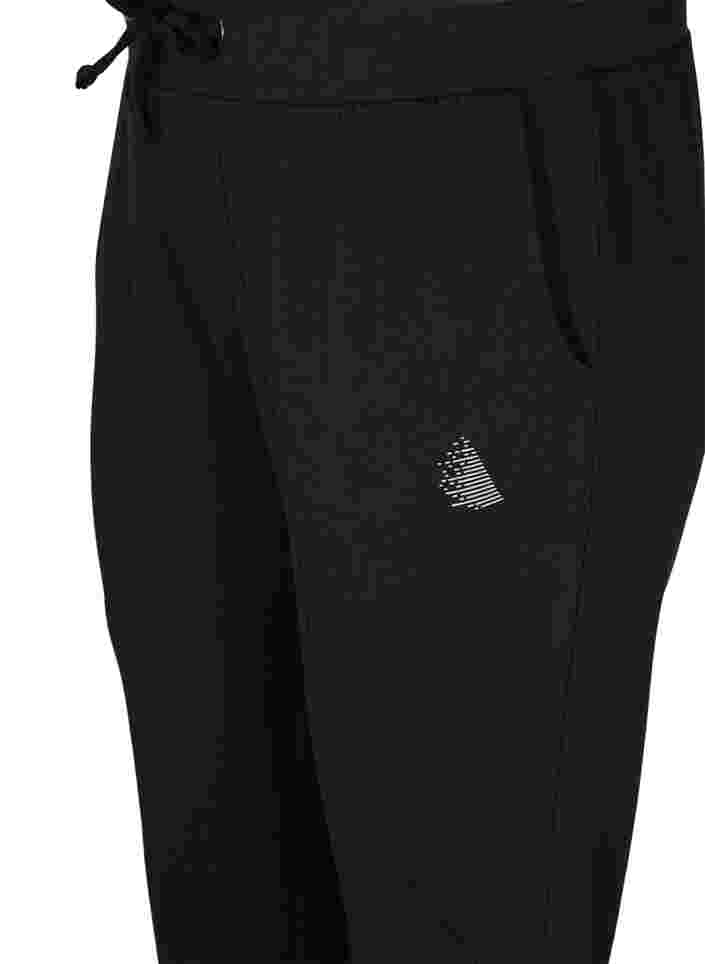 Ensfargede treningsbukser med lommer, Black, Packshot image number 2