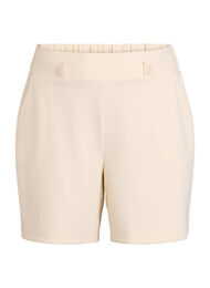 Shorts med lommer og l&oslash;s passform, Beige
