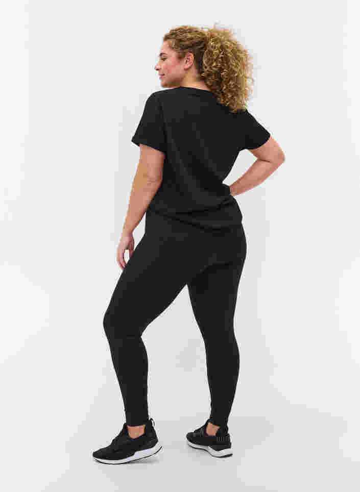 Cropped treningstights med lomme og refleks, Black, Model image number 1