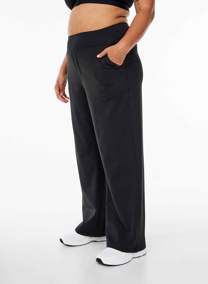 Trendy treningsbukser med en lett utsving, Black, Model