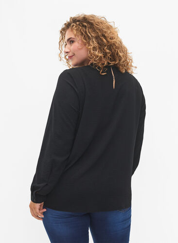 Bluse med lange ermer og blondedetaljer, Black, Model image number 1