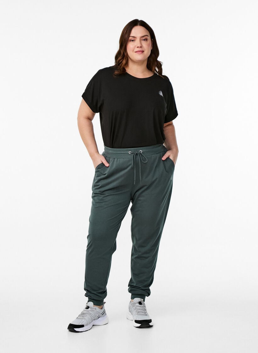 L&oslash;se joggebukser med lommer, Gr&oslash;nn, Model image number 0