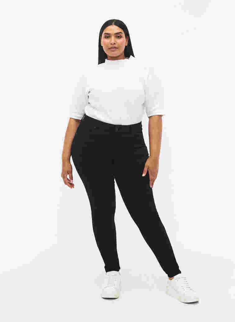 Slim fit bukser med lommer, Black, Model