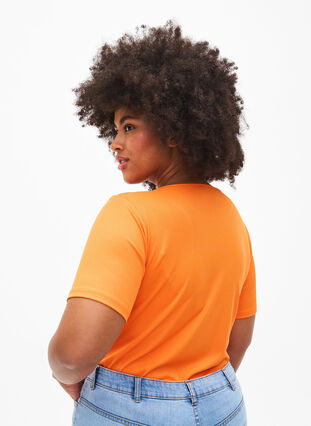 Tettsittende bluse med V-hals og nettingdetaljer, Vibrant Orange, Model image number 1