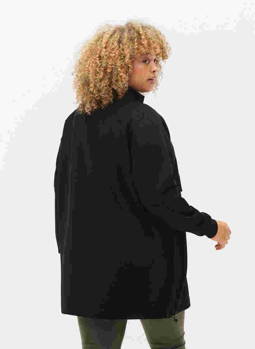 Lang genser med lomme og glidelås, Black, Model image number 1
