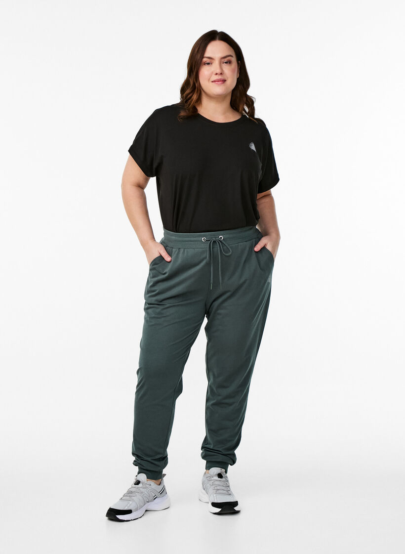 L&oslash;se joggebukser med lommer, Gr&oslash;nn, Model image number 0