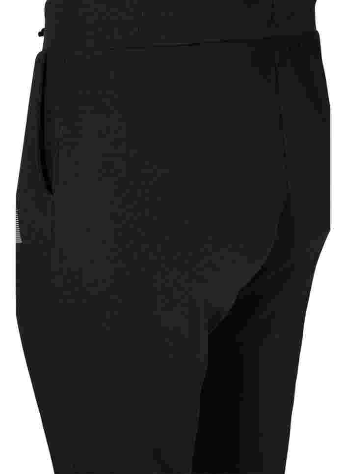 Ensfargede treningsbukser med lommer, Black, Packshot image number 3