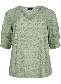 Prikkete bluse med 1/2 ermer