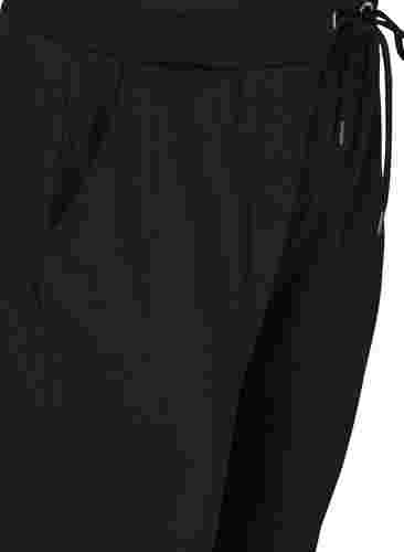 Løse treningsbukser med lommer, Black, Packshot image number 2