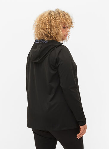 Treningsjakke med quilt og hette, Black, Model image number 1
