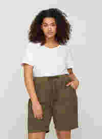 Løse shorts med lommer i bomull, Ivy Green, Model