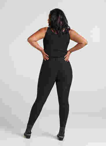 Tettsittende bukser med glidelåsdetaljer, Black, Model image number 2