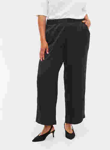 Løse bukser med lommer og strikkant, Black, Model image number 2