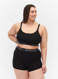 Sømløs shorts med tekstprint, Black, Model