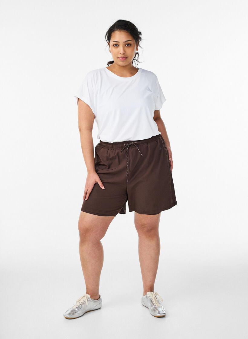 Treningsshorts med innershorts og en lomme til telefonen, Brun, Model image number 1