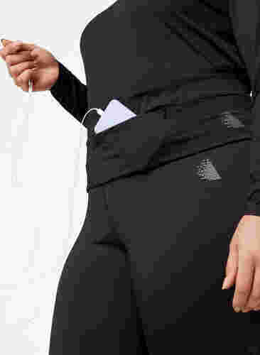 Løpebelte med lommer og glidelås, Black, Model image number 3