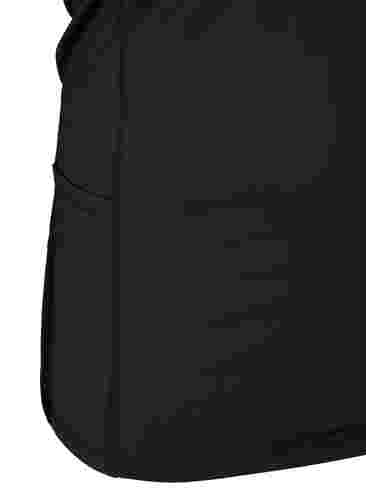 Tettsittende treningstopp med lommer, Black, Packshot image number 3