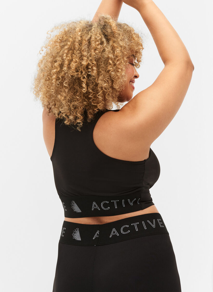 Sports-BH med krysset rygg, Black, Model image number 1