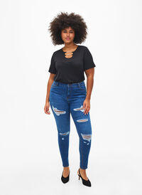 Slim-fit jeans med slitte detaljer, Blue Denim, Model