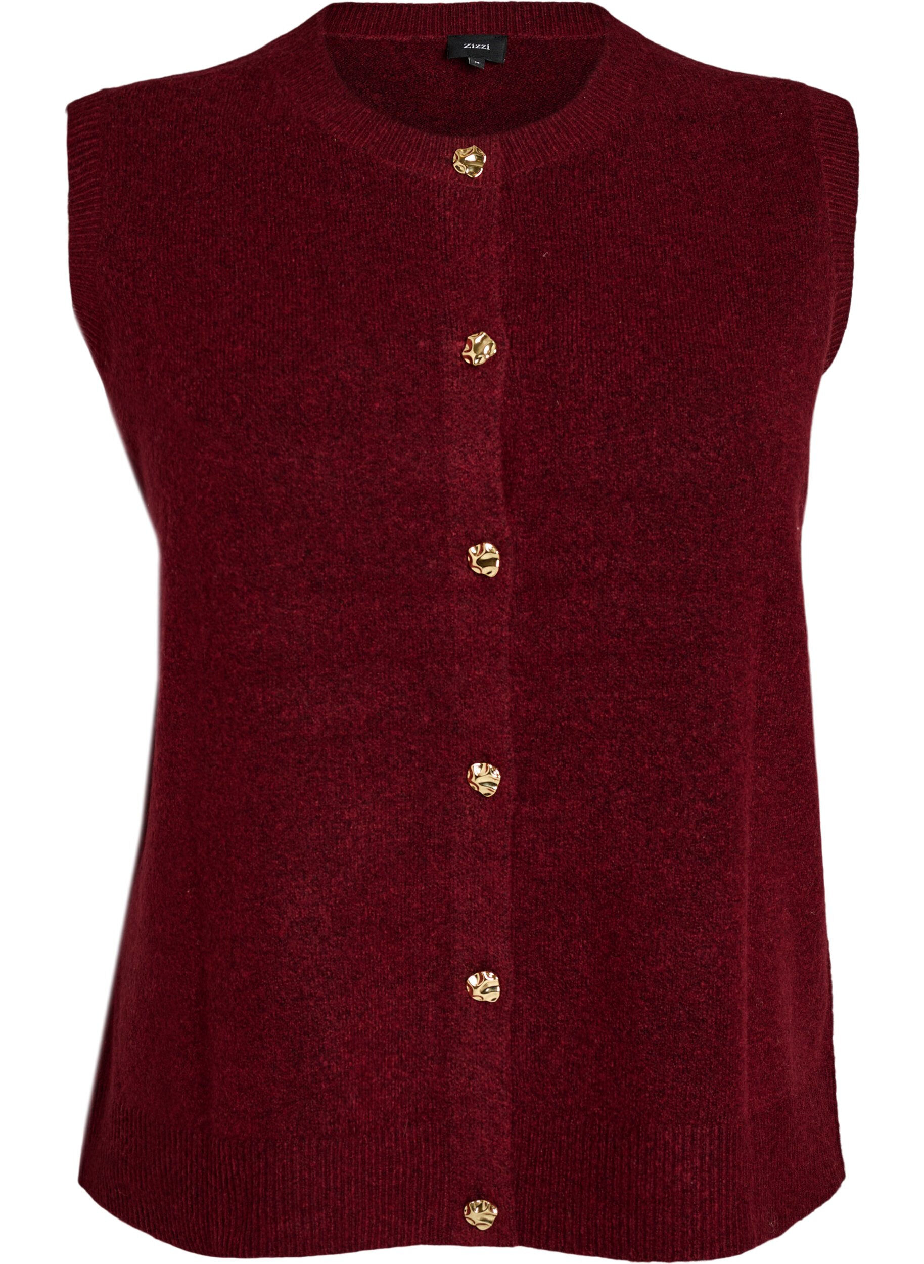 Strikket vest med dekorative knapper