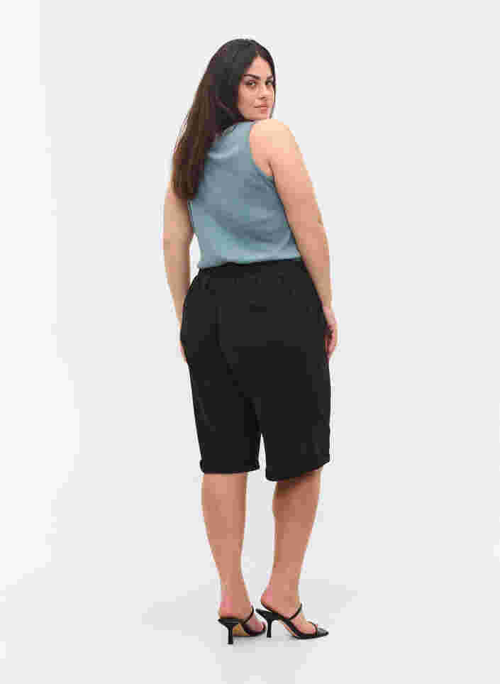 Shorts med strikkant og lommer, Black, Model