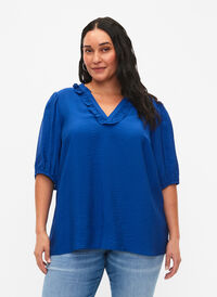 Viskosebluse med puffermer og volanger, Surf the web, Model