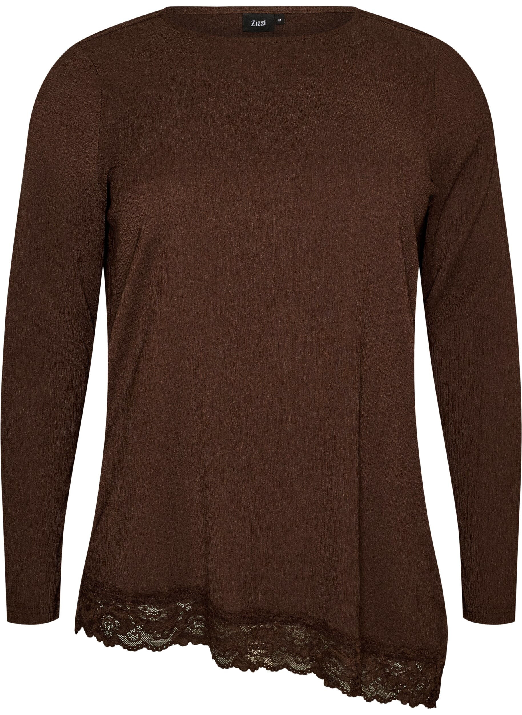 Jerseybluse med asymmetrisk blondedetalj