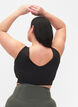 CORE, MID SUPPORT SPORTS BRA - Sports-BH med V-skjæring på ryggen, Black, Model image number 1