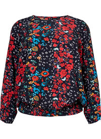 Blomstrete bluse i viskose med smock