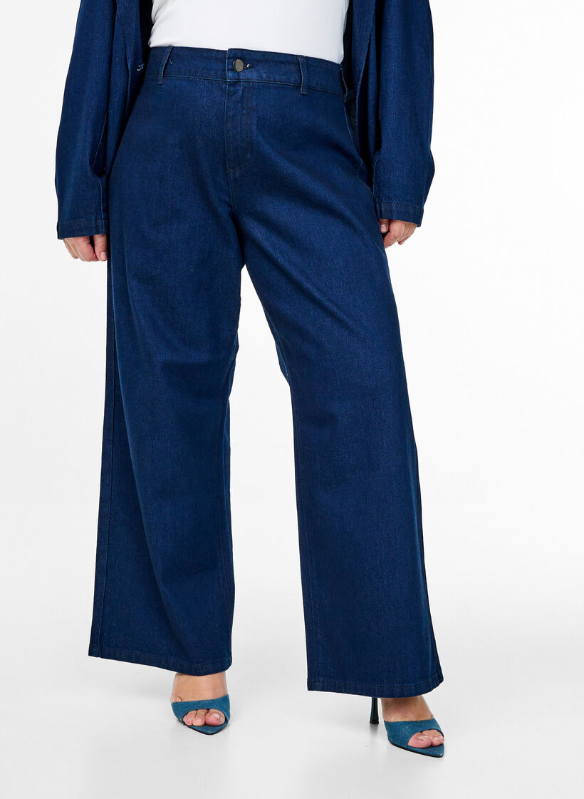 Jeans med høy midje og vide ben, Unwashed, Model