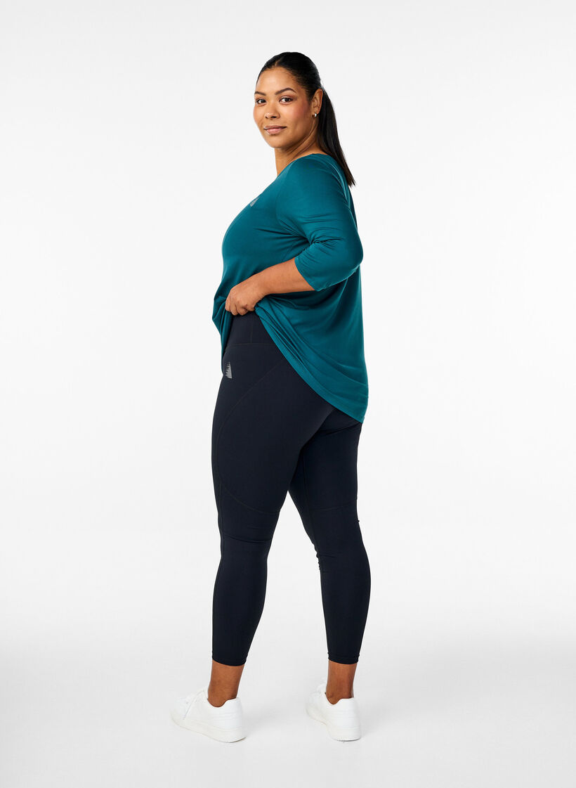 Treningsleggings med forsterkning på innsiden av lårene, Black, Model image number 1